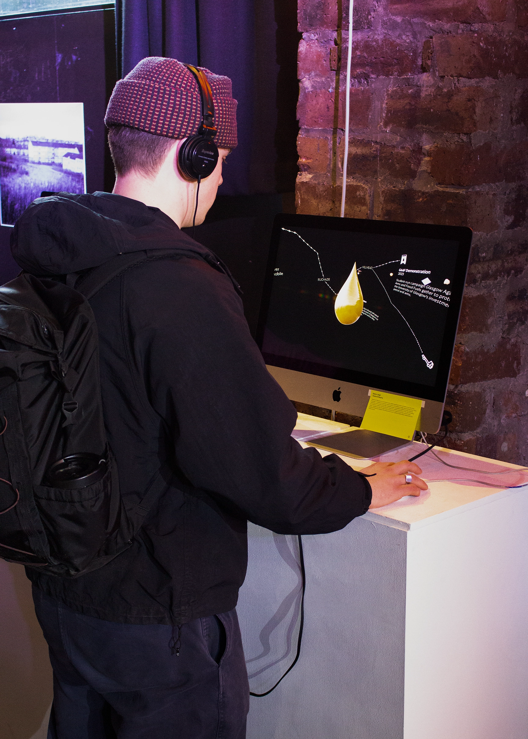 A user interacting with a high-fidelity prototype of Relational Mapping at exhibition